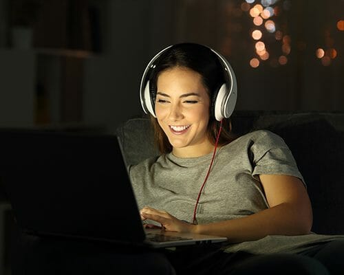 Image of woman watching video content using Affectiva's Emotion AI for Video Testing